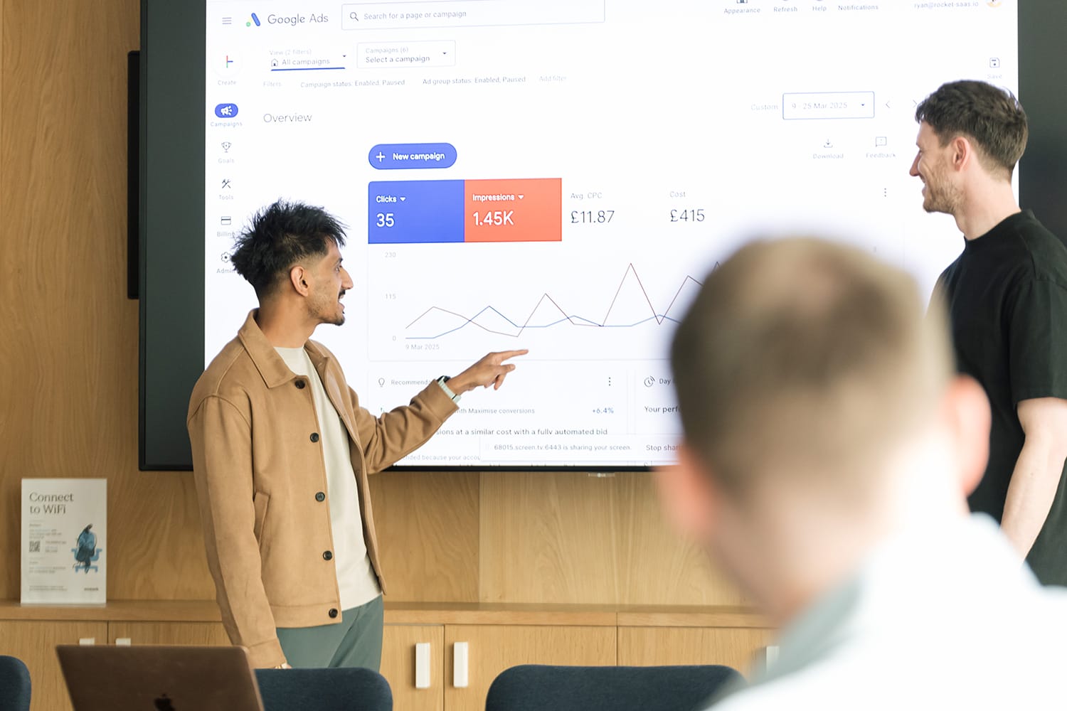 Jilan & Nick analyzing a Google Ads chart